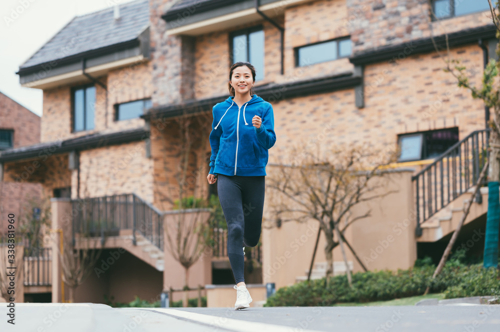 young asian beauty woman running outdoors