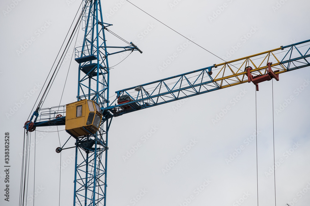 crane works at a construction site crane works at a construction site