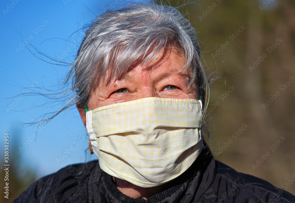 Elderly senior woman with gray hair wearing home made cloth face mouth nose  virus mask outside. Can be used during coronavirus covid-19 outbreak  prevention Stock Photo | Adobe Stock