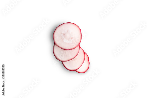 Fresh sliced radish isolated on white background. Top view.