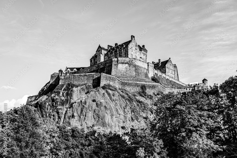 Edinburgh Castle  on top of the Castle Rock in black and white