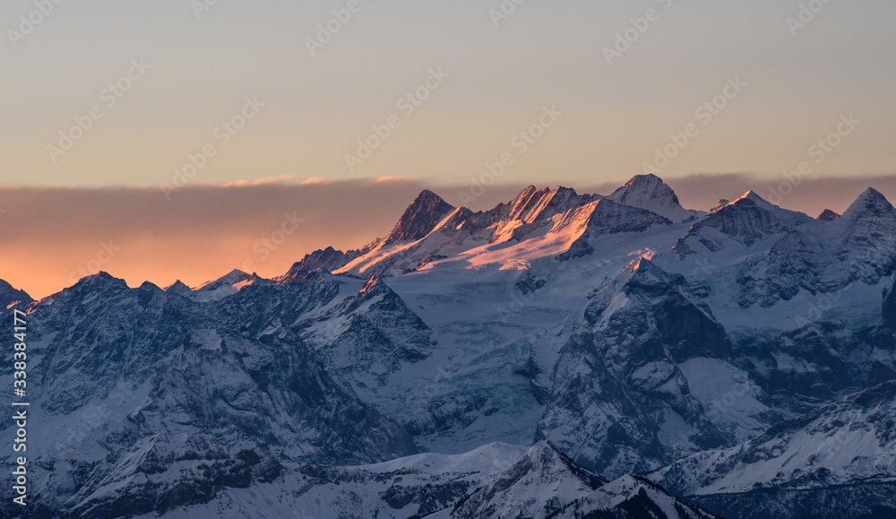 Fototapeta premium Sunrays on a mountain in the Swiss Alps