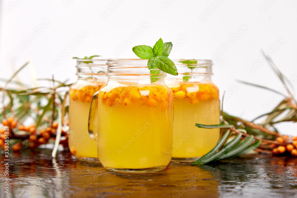 Vitaminic healthy sea buckthorn tea, Virus protection drink, coronavirus, immunity concept. Vitaminic healthy sea buckthorn tea, Virus protection drink, coronavirus, immunity concept.