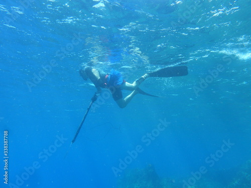 man snorkeling in the ocean