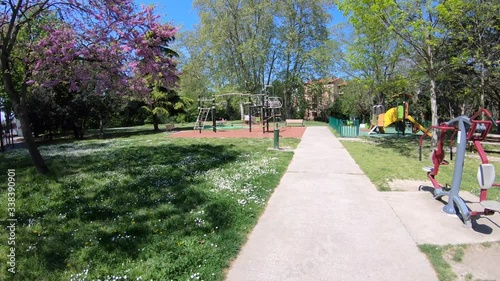 Walking Through Empty Children's Park Due to Coronavirus (COVID-19) on a Bright Sunny Spring Day in Toulouse, France