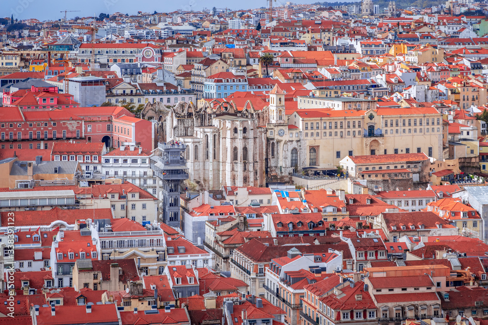 Beautiful panoramic view of Lisbon city with a focus on famous attractions The Elevador de Santa and Justa Convento do Carmo.