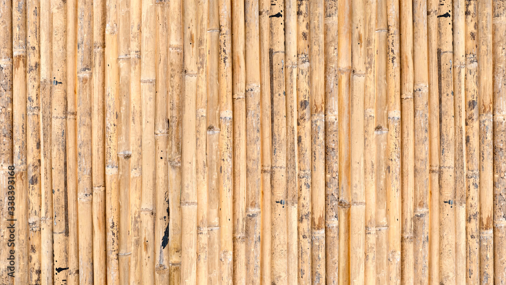 Naklejka premium bamboo fence or wall texture background