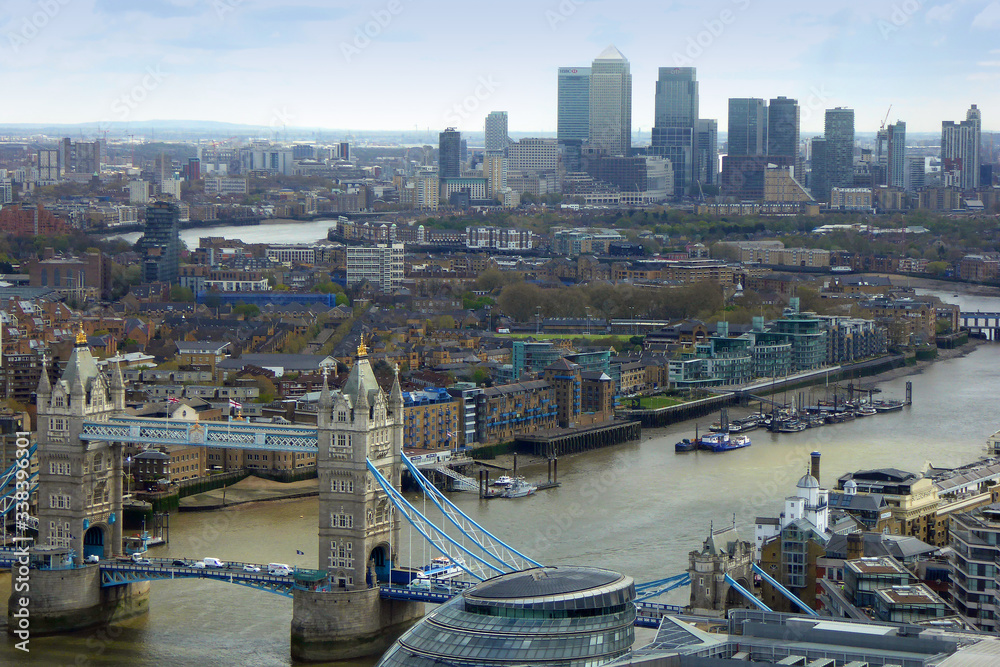 Aerial view of the River Thames from Tower Bridge towards Canary Wharf skyline London