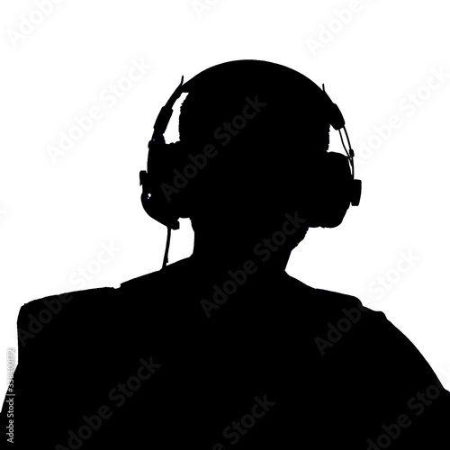 Obraz na plátně silhouette of a man wearing spy headphones