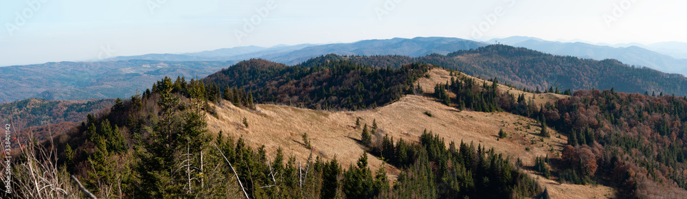 View from high mountain on picturesque landscape autumn Carpathian mountains.