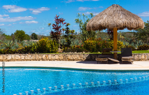 pool scene at hotel on a sisal agave plantation 
