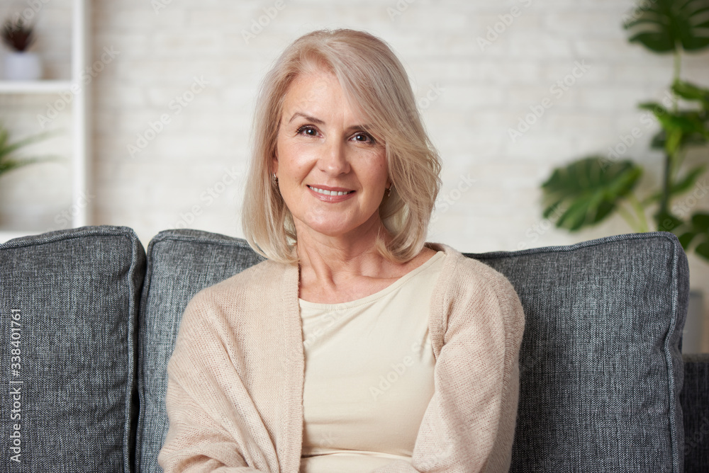 Portrait of older woman smiling at home Portrait of older woman smiling at home