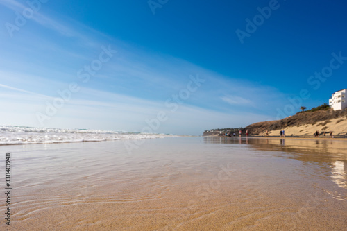 Sandy beach and calm sea in the Canary Islands