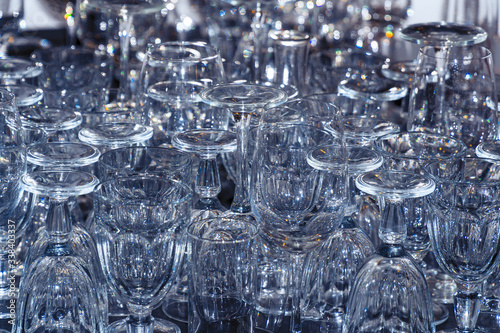 Many of Clean empty wine glasses on the table. Soft focus