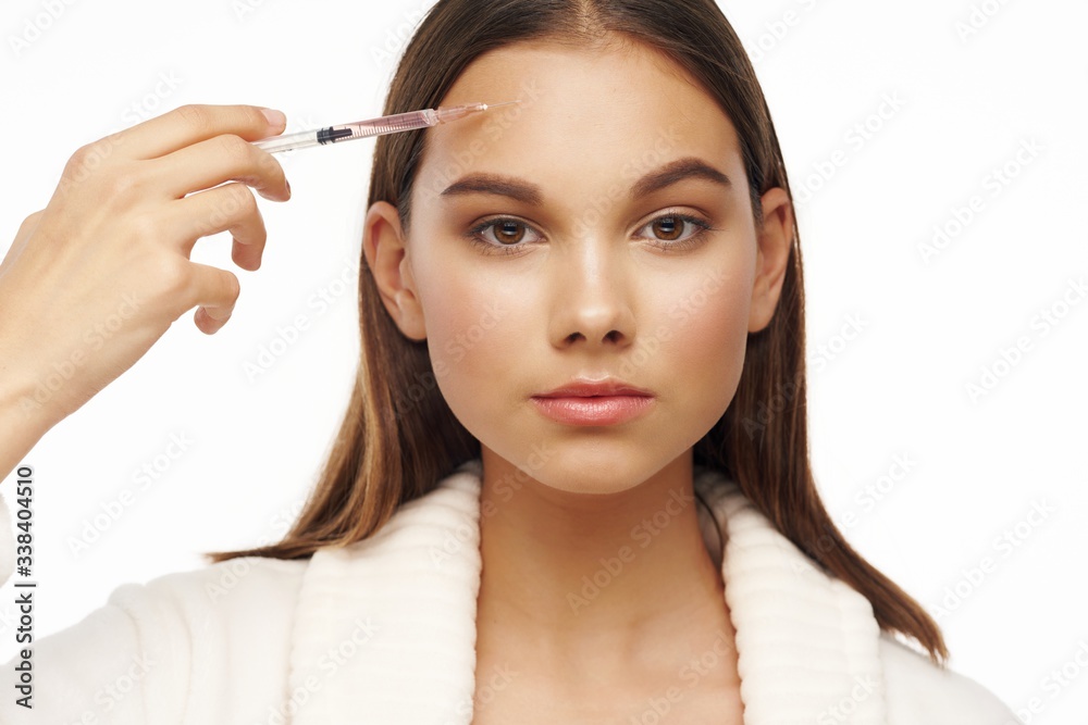 woman applying mascara