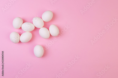 Beautiful banner with easter eggs. Food event concept. Bright festive decor. Colorful pink background. Flat design with copy space.