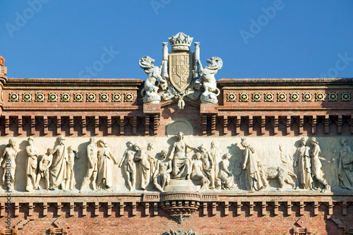 Detail shot of Arc de Triumf: L'Arc de Triumph, by Josep Vilaseca I Casanovas, in Barcelona, Spain was built in 1888 as part of the Universal Exposition photo