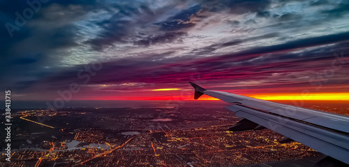 Early morning shot of Amsterdam from a plane with dramatic sky