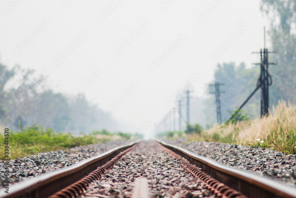 Obraz premium The train route seems to be lonely because the train is one of the public transportation systems across the province and train travel has been suspended to prevent the spread of coronavirus covid-19.