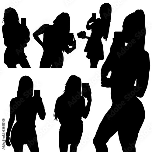 girl silhouette make selfie with smartphone