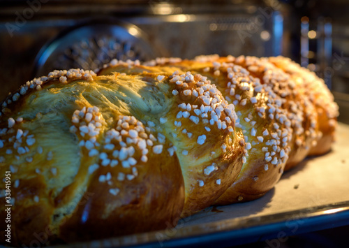 Braided sweet yeast bread in an oven