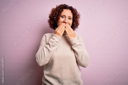 Принти на полотні Middle age beautiful curly hair woman wearing casual turtleneck sweater over pin
