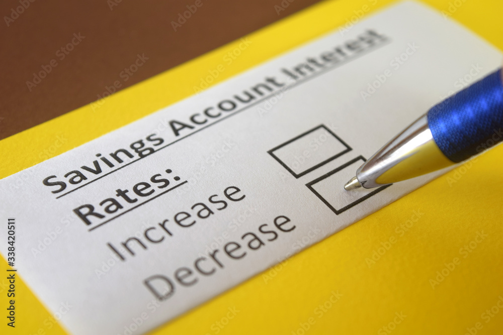 Obraz premium One person is answering question about savings account interest rates.