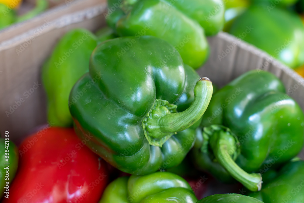 A pile of fresh peppers sold in the fresh market A pile of fresh peppers sold in the fresh market