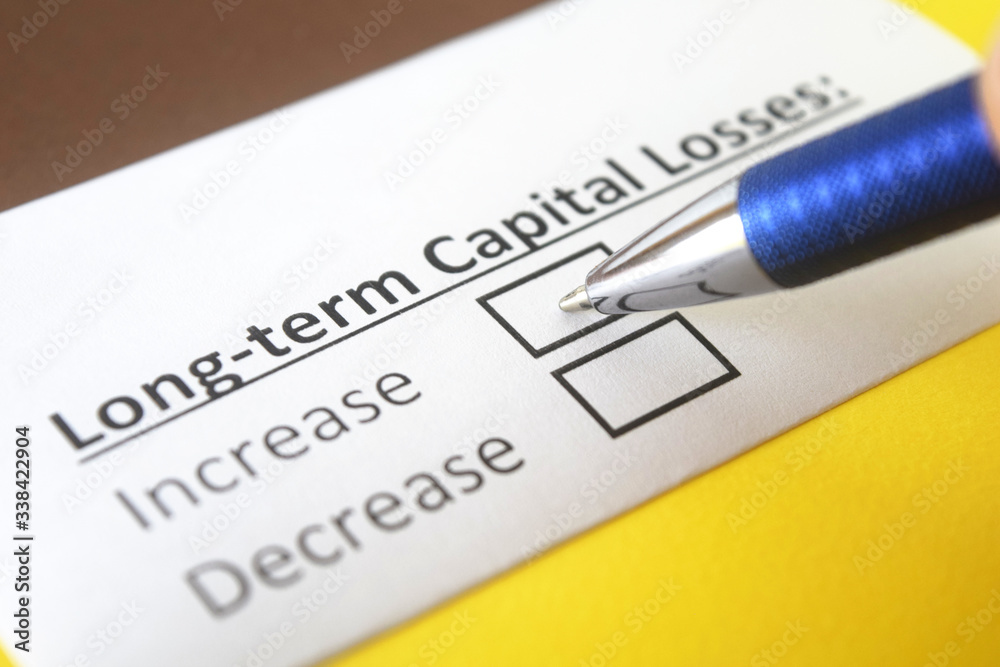 One person is answering question about long term capital losses. One person is answering question about long term capital losses.