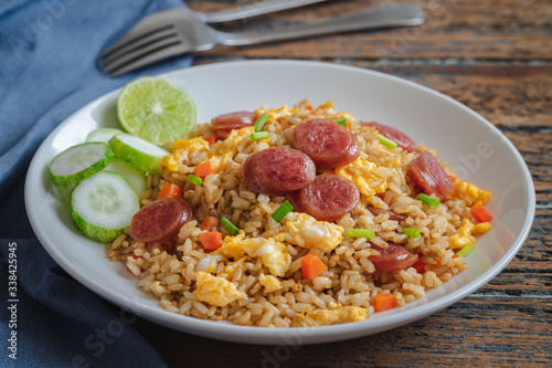 Fried rice with chinese sausage on plate