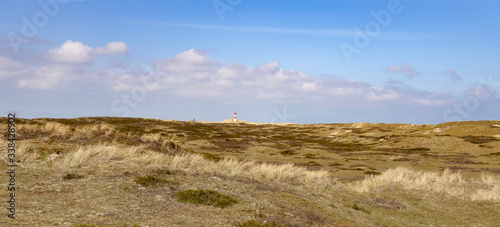 dunes with small lighthouse © Frank