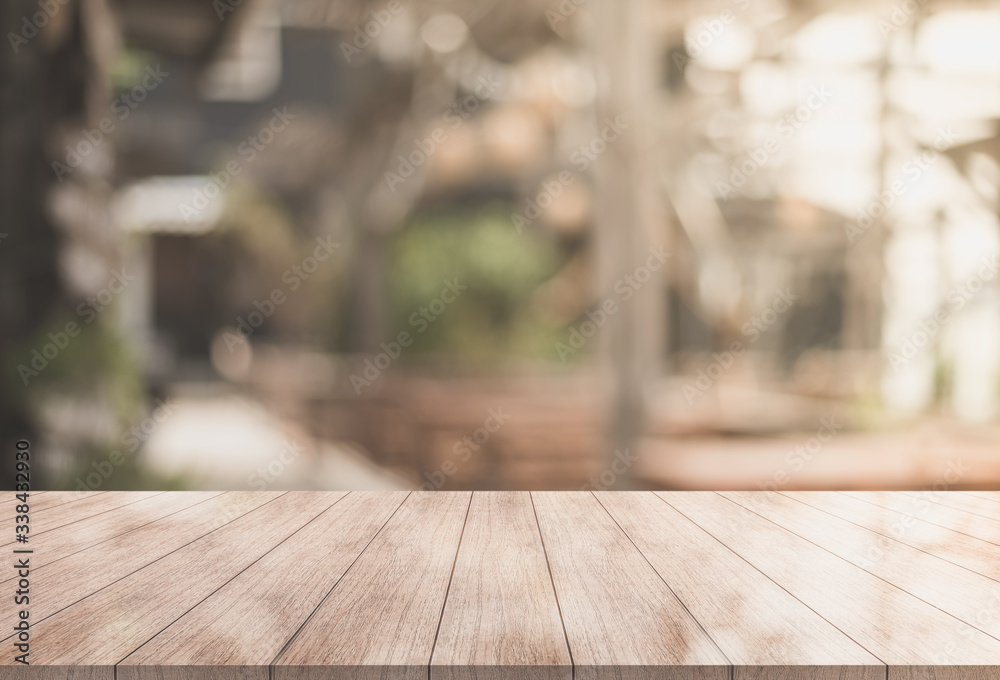 3D Rendering, Wooden top table with bokeh light effect and blur restaurant on background, blur background 3D Rendering, Wooden top table with bokeh light effect and blur restaurant on background, blur background