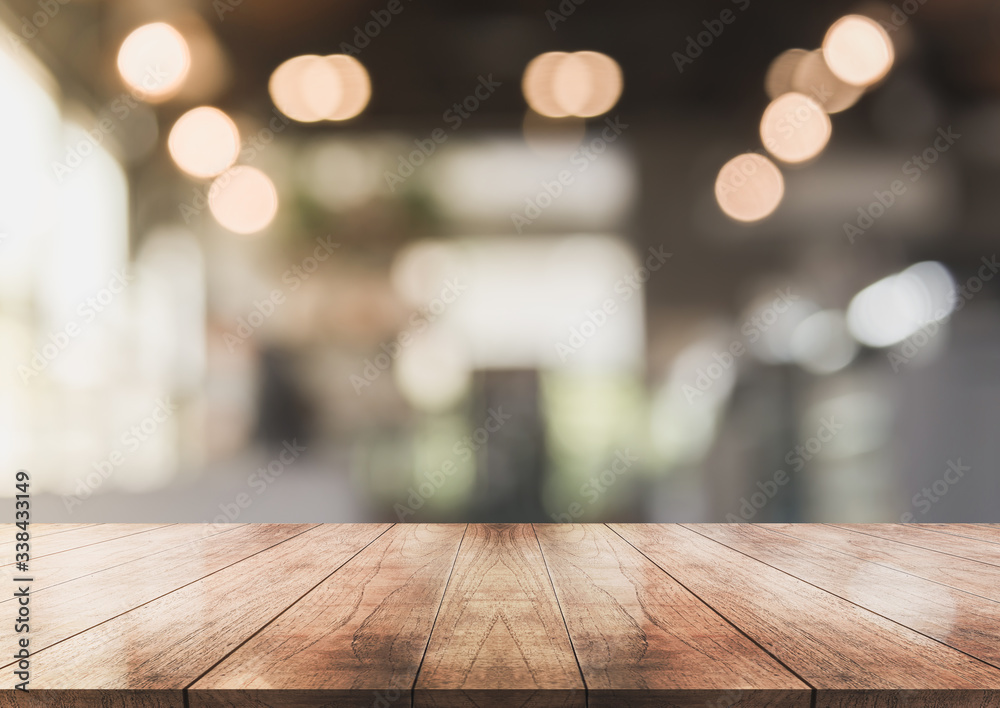3D Rendering, Wooden top table with bokeh light effect and blur restaurant on background, blur background