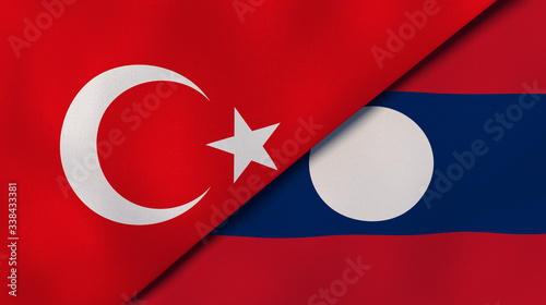 The flags of Turkey and Laos. News, reportage, business background. 3d illustration photo