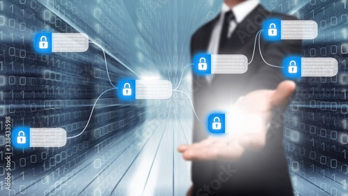 Fotografija Businessman and analytics symbols on blurred background