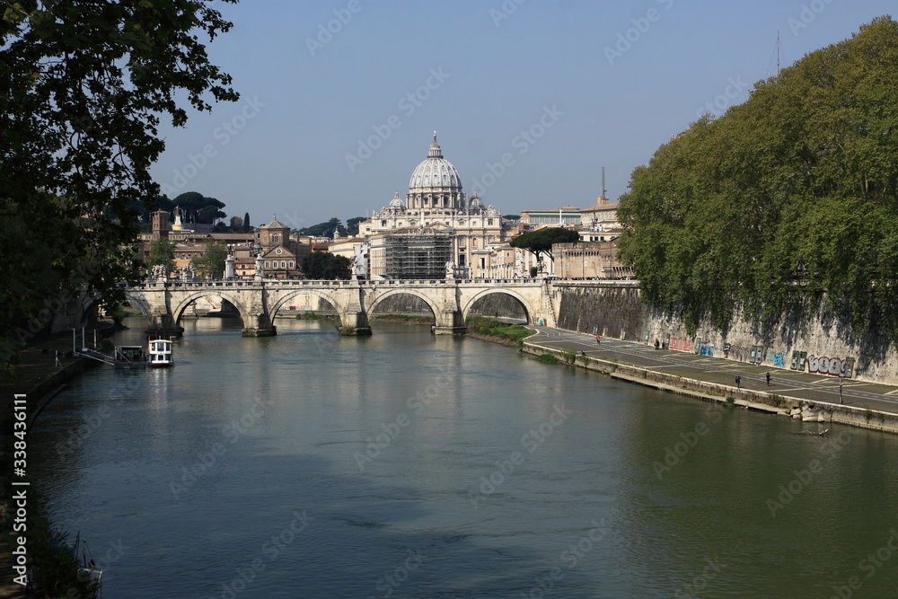 Tiber river in Rome on a spring morning, view of St. Peter's Basilica in the Vatican