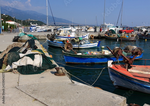 Fishing boats in a small port in a Greek city near Mount Olympus