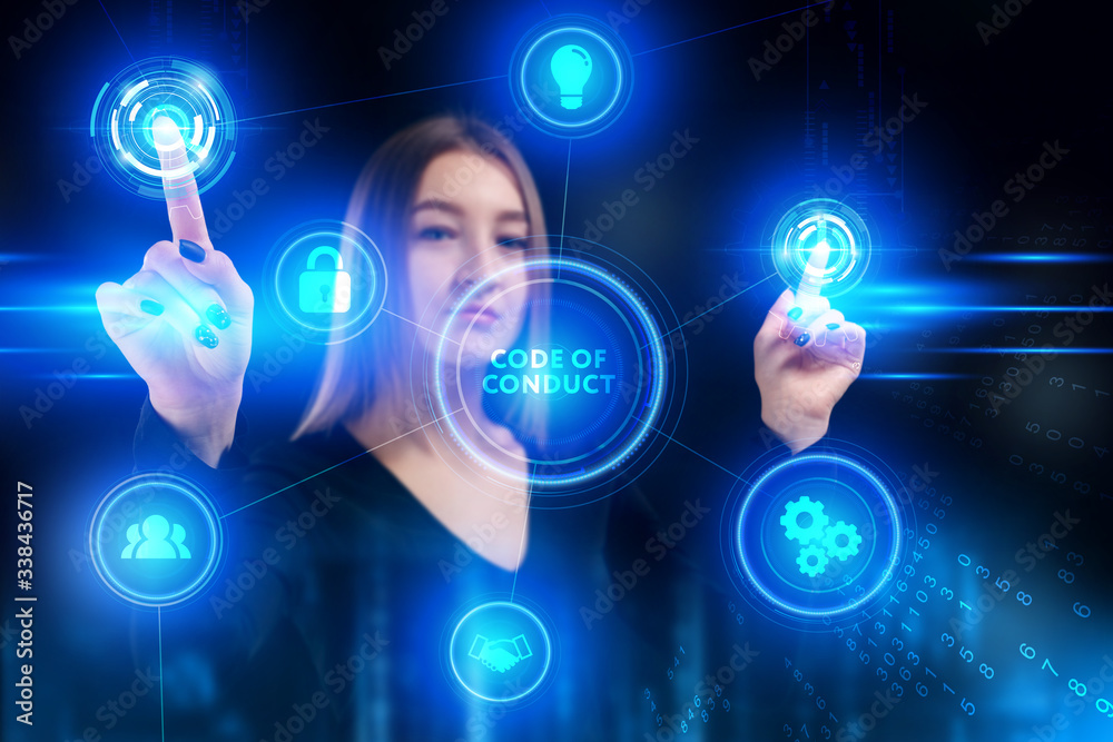 Business, Technology, Internet and network concept. Young businessman working on a virtual screen of the future and sees the inscription: Code of conduct Business, Technology, Internet and network concept. Young businessman working on a virtual screen of the future and sees the inscription: Code of conduct