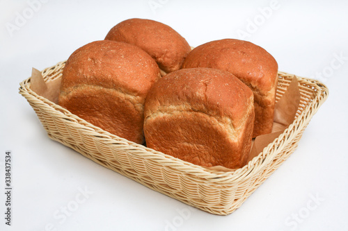 white bread in basket white background