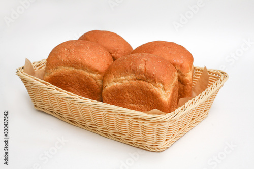 white bread in basket white background