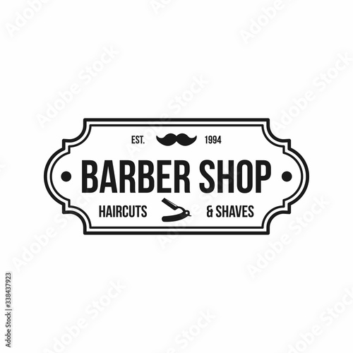 Barber shop vector vintage label, badge, or emblem on white background