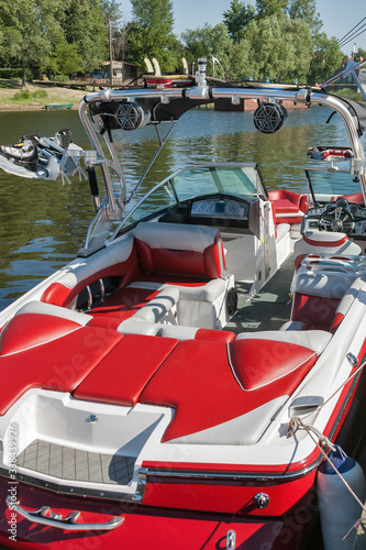 Slika na platnu Luxury speed boat with wakeboard on a sunny day