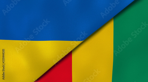 The flags of Ukraine and Guinea. News, reportage, business background. 3d illustration photo
