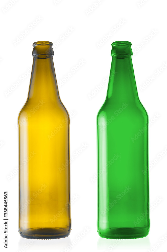Two empty beer bottles close up isolated on white background Two empty beer bottles close up isolated on white background