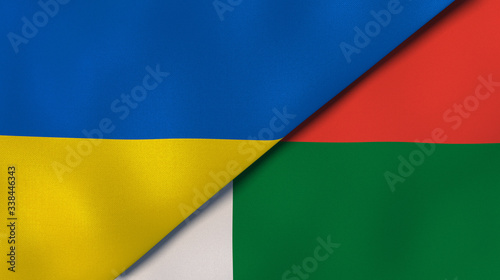 The flags of Ukraine and Madagascar. News  reportage  business background. 3d illustration