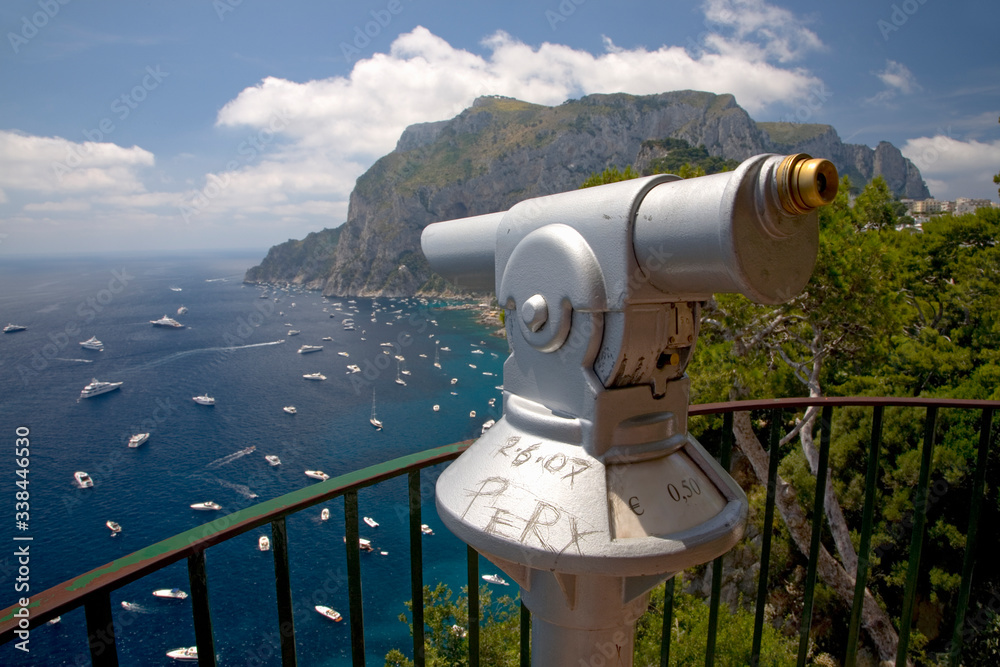 Telescope viewer of City of Capri, an Italian island off the Sorrentine Peninsula on the south side of Gulf of Naples, in the region of Campania, Province of Naples, Italy, Europe