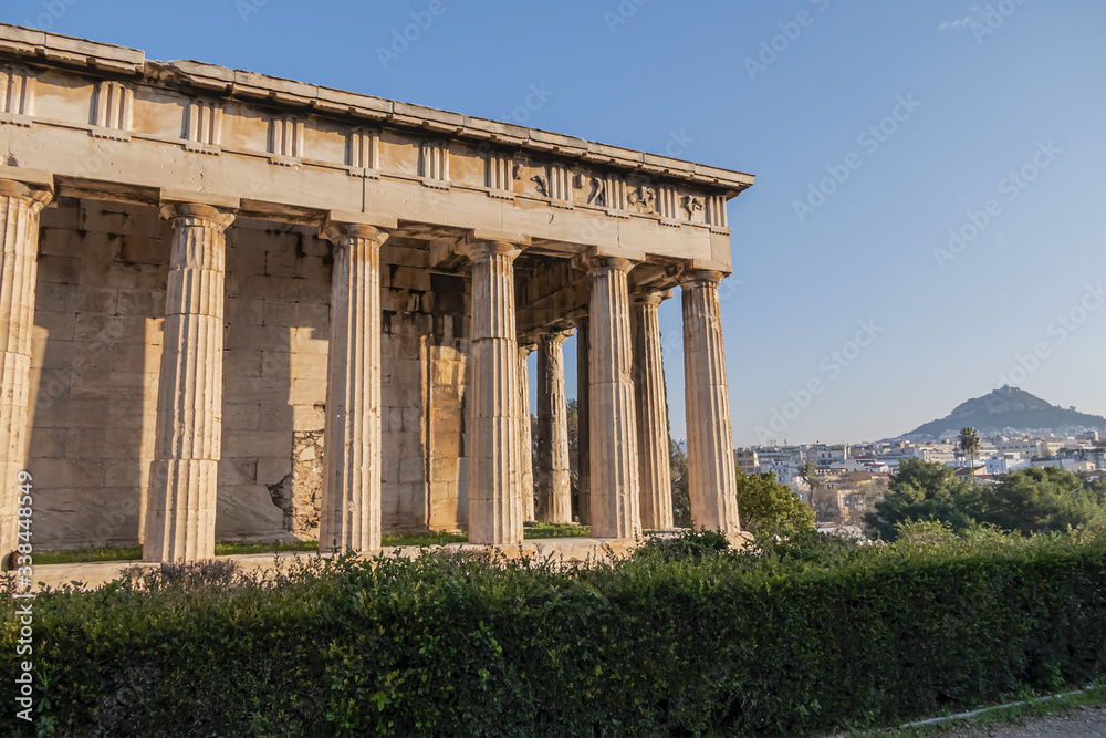 Temple of Hephaestus (Hephaisteion) - well-preserved Greek temple. Temple of Hephaestus is Doric peripheral temple; located at north-west side of Athens Agora on top of Agoraios Kolonos hill. Greece. Temple of Hephaestus (Hephaisteion) - well-preserved Greek temple. Temple of Hephaestus is Doric peripheral temple; located at north-west side of Athens Agora on top of Agoraios Kolonos hill. Greece.