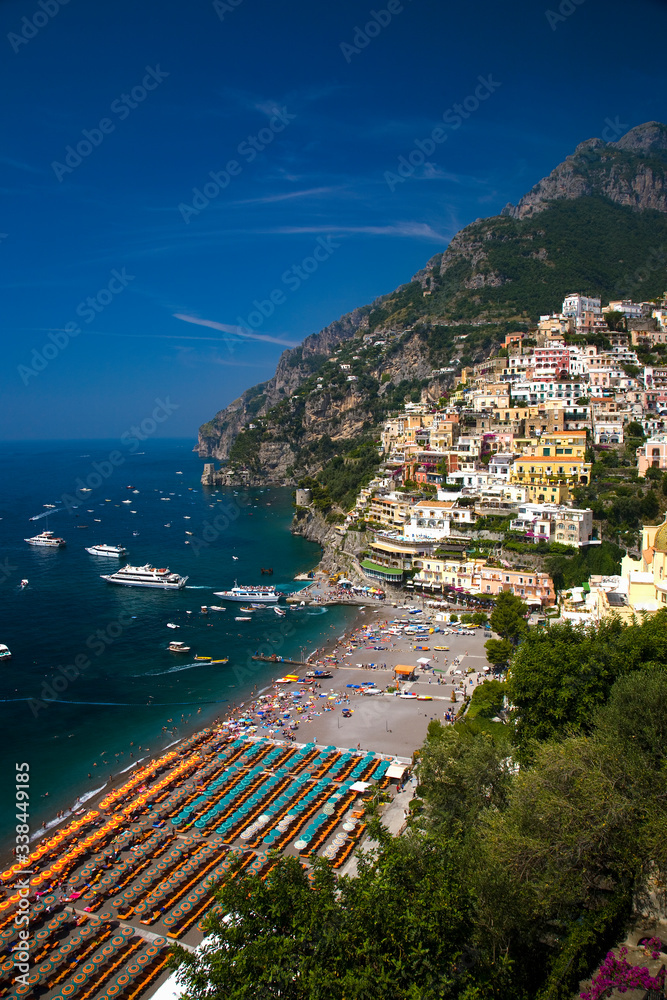 Elevated view of beach umbrellas of Amalfi, a town in the province of Salerno, in the region of Campania, Italy, on the Gulf of Salerno, 24 miles southeast of Naples