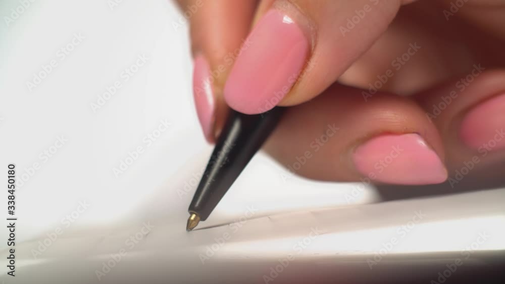 write with pen in notebook text macro shot