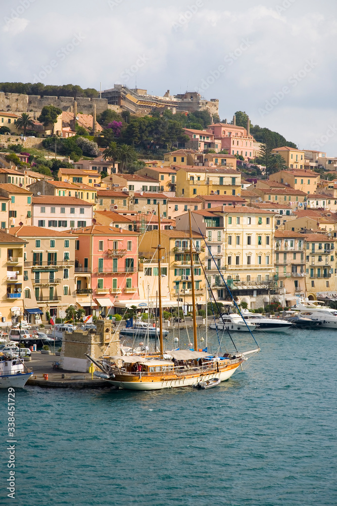Water view of colorful buildings and harbor of Portoferraio, Province of Livorno, on the island of Elba in the Tuscan Archipelago of Italy, Europe, where Napoleon Bonaparte was exiled in 1814